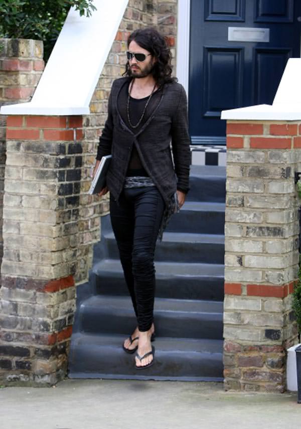 Russell Brand wearing tight black jeans