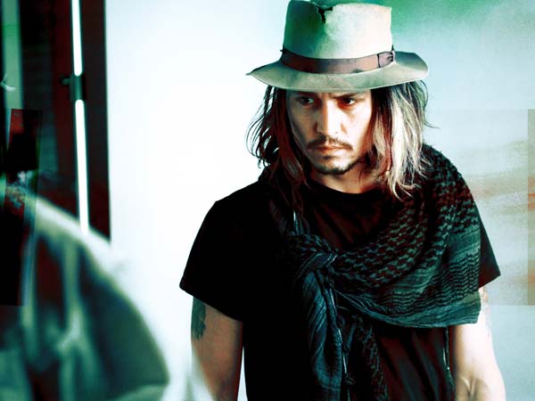 Johnny Depp lover of hats and scarves