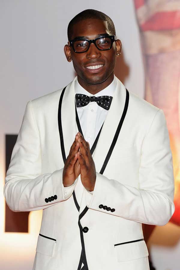 Tinie Tempah in a white dinner suit