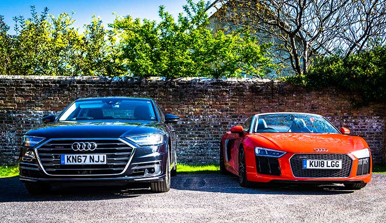 Audi A8 and R8 sitting side by side
