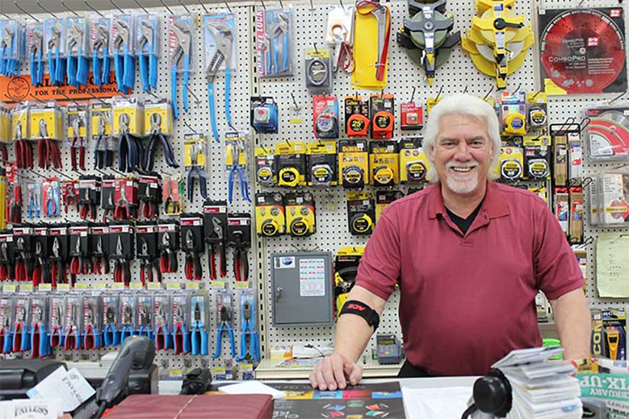 man in tool shop