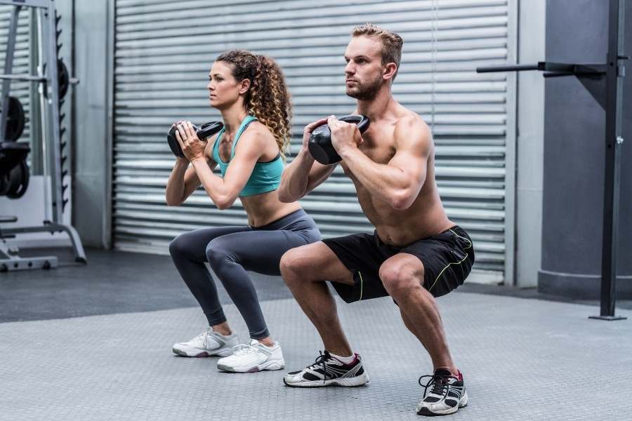 Gym couple exercise