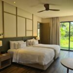 The Garden Villa water Lilly lake Melia Ho Tram Beach Resort Vietnam bedroom king size bed